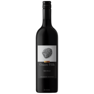 Granite Hills Shiraz wine bottle on a gray background